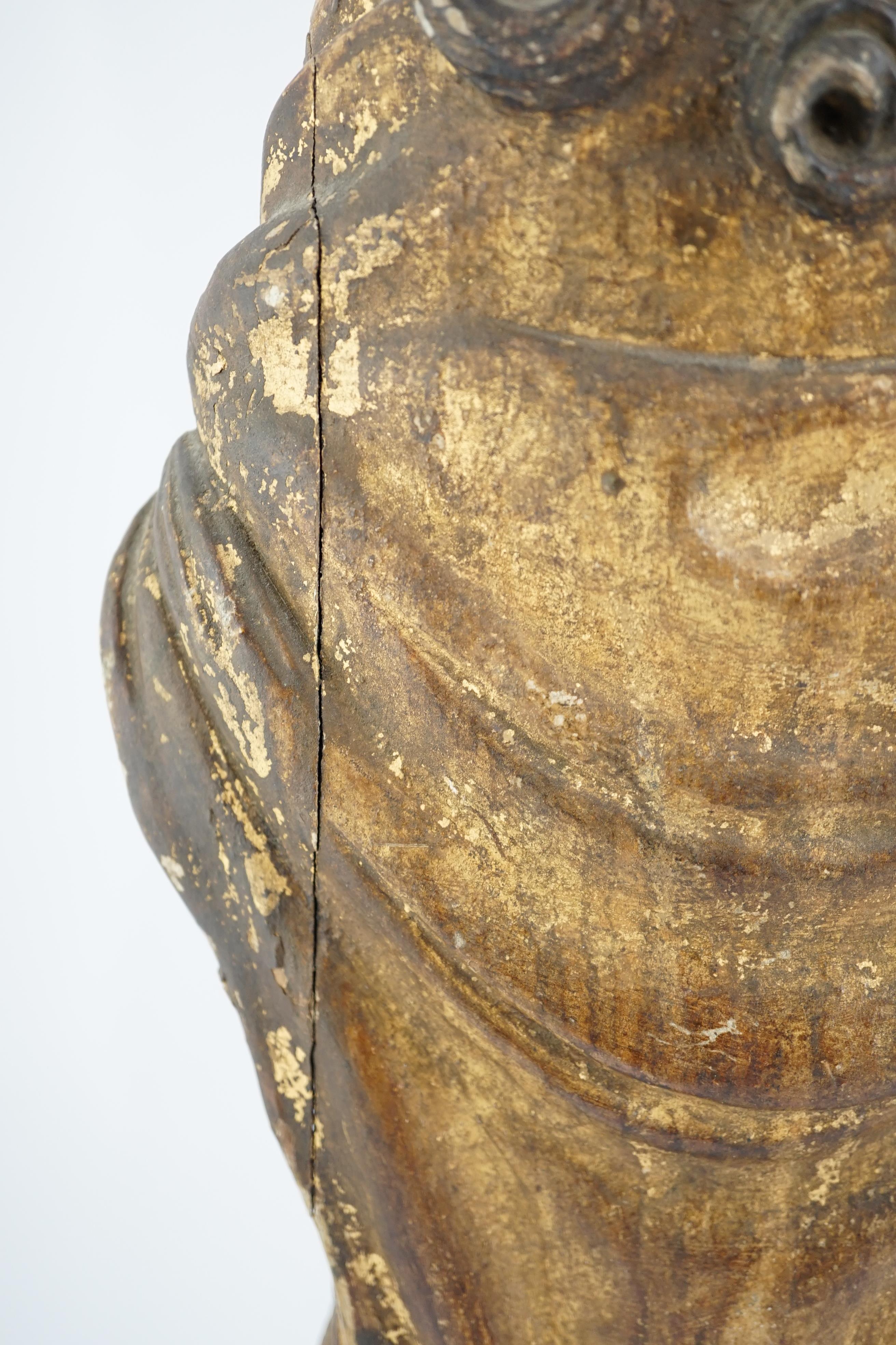 An 18th century Continental carved wood figure of a female saint